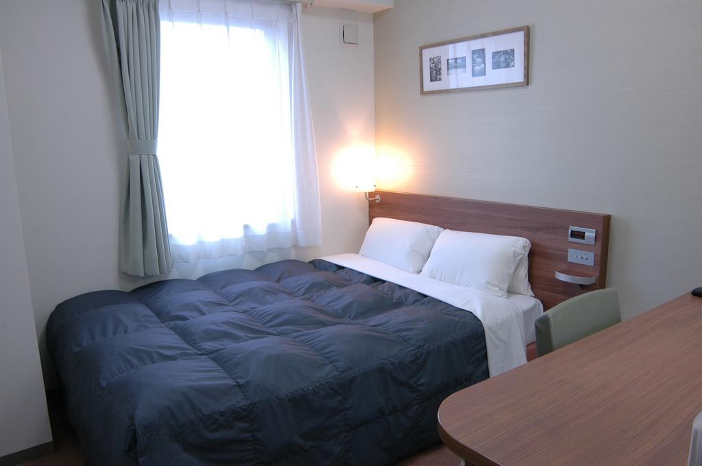 Hotel Econo Tsu Station Esterno foto