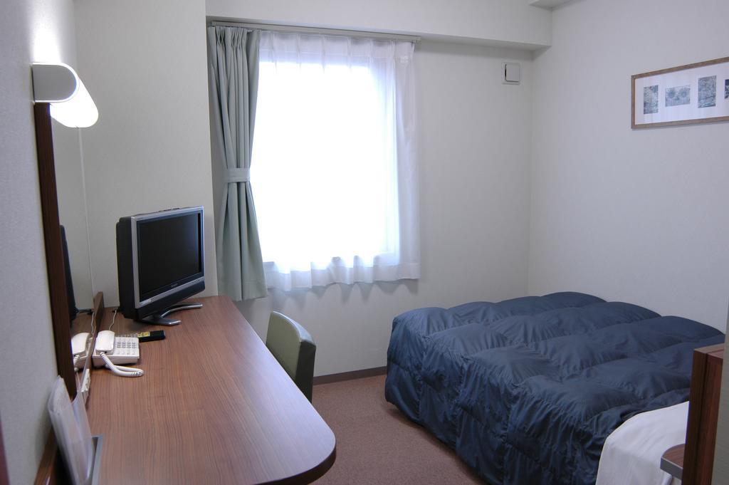 Hotel Econo Tsu Station Esterno foto
