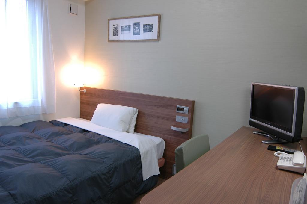 Hotel Econo Tsu Station Esterno foto